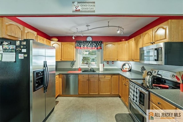 23 Spring St, Franklin, NJ 08873 - kitchen featuring stainless steel appliances and a sink