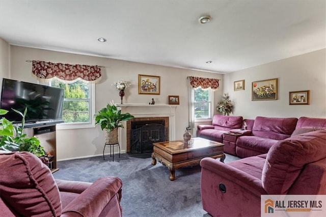23 Spring St, Franklin, NJ 08873 - living area with carpet flooring, a fireplace with flush hearth, and recessed lighting