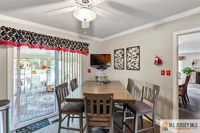 23 Spring St, Franklin, NJ 08873 - dining space with crown molding, plenty of natural light, and ceiling fan