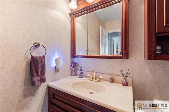 23 Spring St, Franklin, NJ 08873 - bathroom featuring vanity and toilet