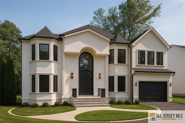3774 Park Ave, Edison, NJ 08820 - french provincial home with driveway, a garage, stucco siding, and a front yard