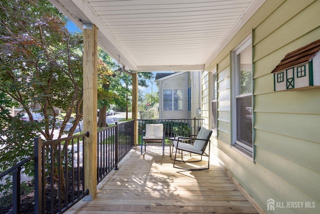 deck featuring covered porch