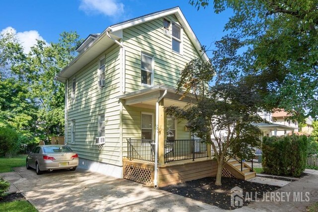 view of property with covered porch