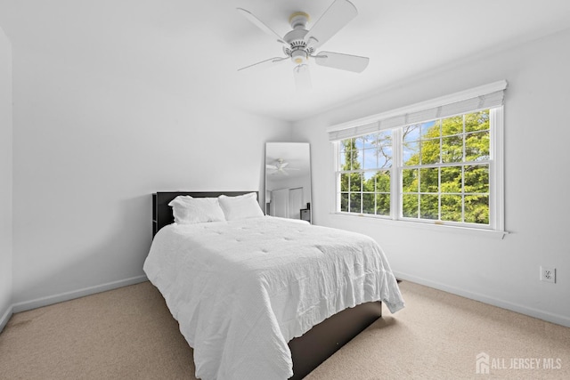 24 Saddle Ct, Monroe, NJ 08831 - carpeted bedroom with baseboards and a ceiling fan