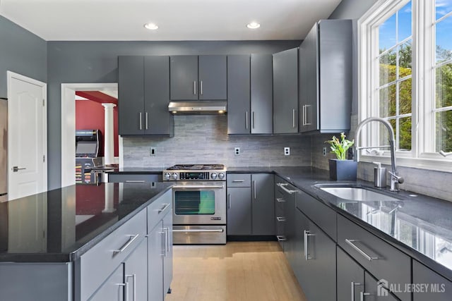 24 Saddle Ct, Monroe, NJ 08831 - kitchen featuring gas stove, under cabinet range hood, a sink, plenty of natural light, and recessed lighting