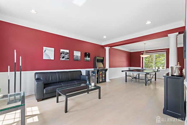 24 Saddle Ct, Monroe, NJ 08831 - living area featuring ornate columns, crown molding, a wainscoted wall, wood finished floors, and recessed lighting