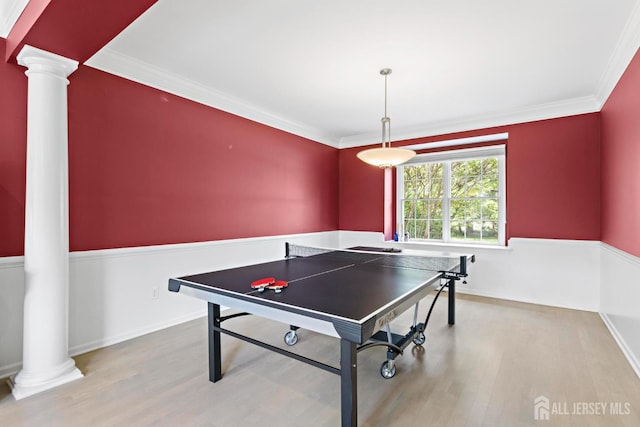 24 Saddle Ct, Monroe, NJ 08831 - recreation room featuring decorative columns, wood finished floors, ornamental molding, and baseboards