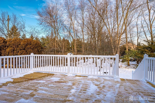 view of snow covered deck