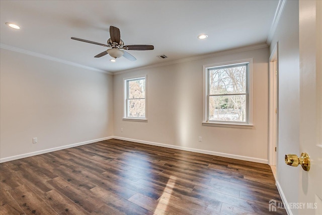 empty room with crown molding, dark hardwood / wood-style floors, and ceiling fan