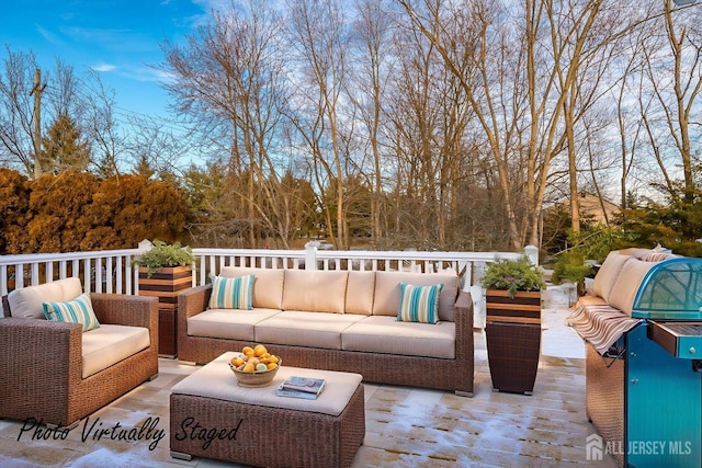 deck with an outdoor hangout area