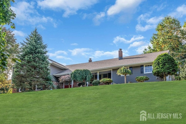 ranch-style house with a front yard