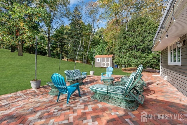 view of patio with a storage shed