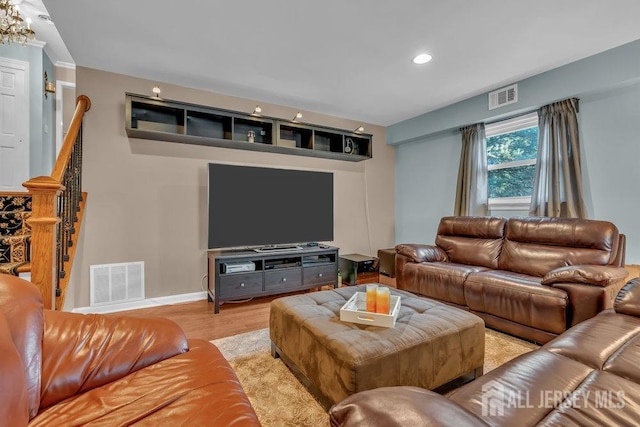 living room with light hardwood / wood-style flooring