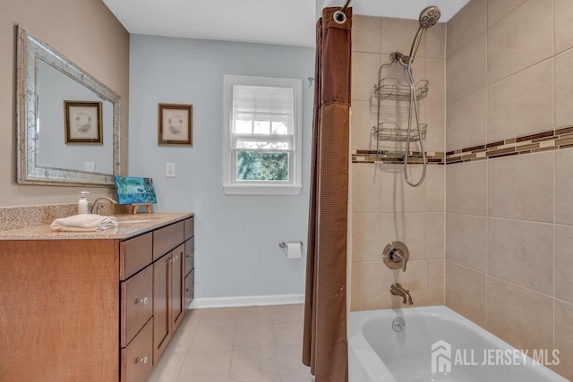 bathroom with shower / bath combo with shower curtain, vanity, and tile patterned floors