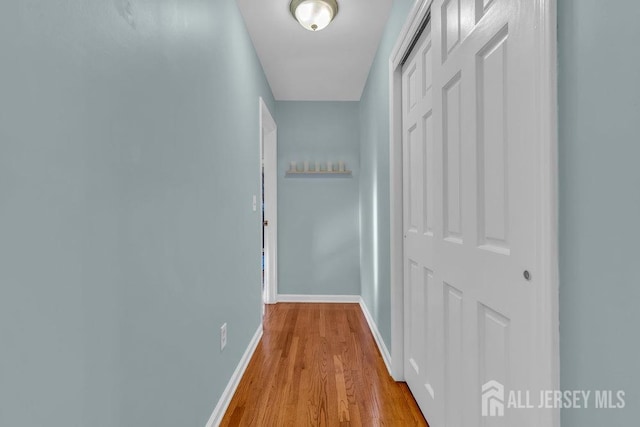 hallway featuring light hardwood / wood-style flooring