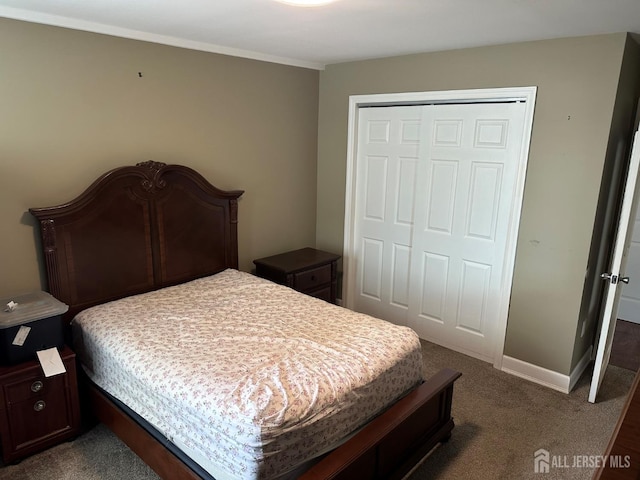 9 Maine Ct, Old Bridge, NJ 07747 - bedroom featuring a closet, dark carpet, and crown molding