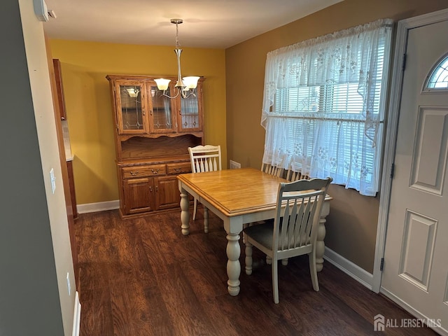 9 Maine Ct, Old Bridge, NJ 07747 - dining area featuring a chandelier and dark wood-style flooring