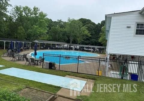 9 Maine Ct, Old Bridge, NJ 07747 - community pool featuring a patio area