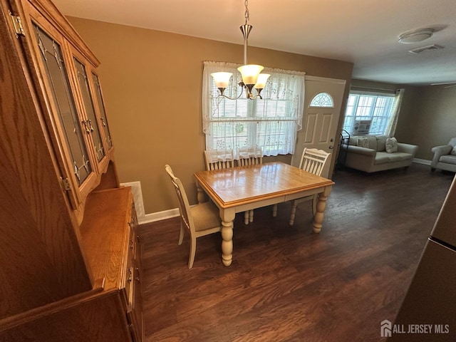 9 Maine Ct, Old Bridge, NJ 07747 - dining room featuring a chandelier and dark wood finished floors