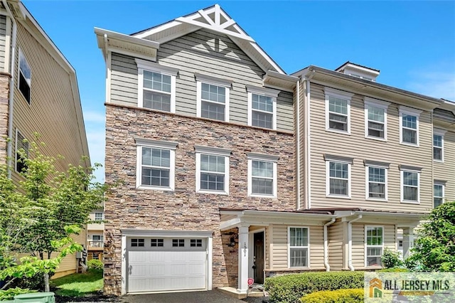 1501 Hights Farm Rd Unit 1501, Monroe, NJ 08831 - multi unit property featuring stone siding, an attached garage, and asphalt driveway