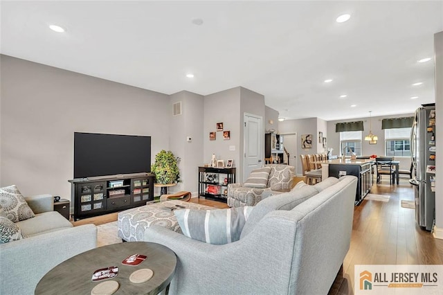 1501 Hights Farm Rd Unit 1501, Monroe, NJ 08831 - living room featuring recessed lighting and light wood-type flooring