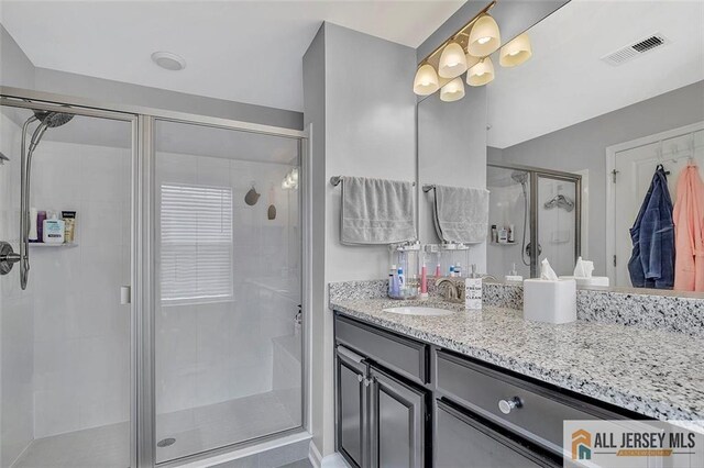 1501 Hights Farm Rd Unit 1501, Monroe, NJ 08831 - bathroom with vanity and a stall shower