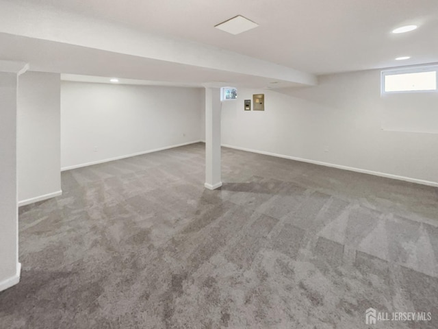 basement with carpet and baseboards