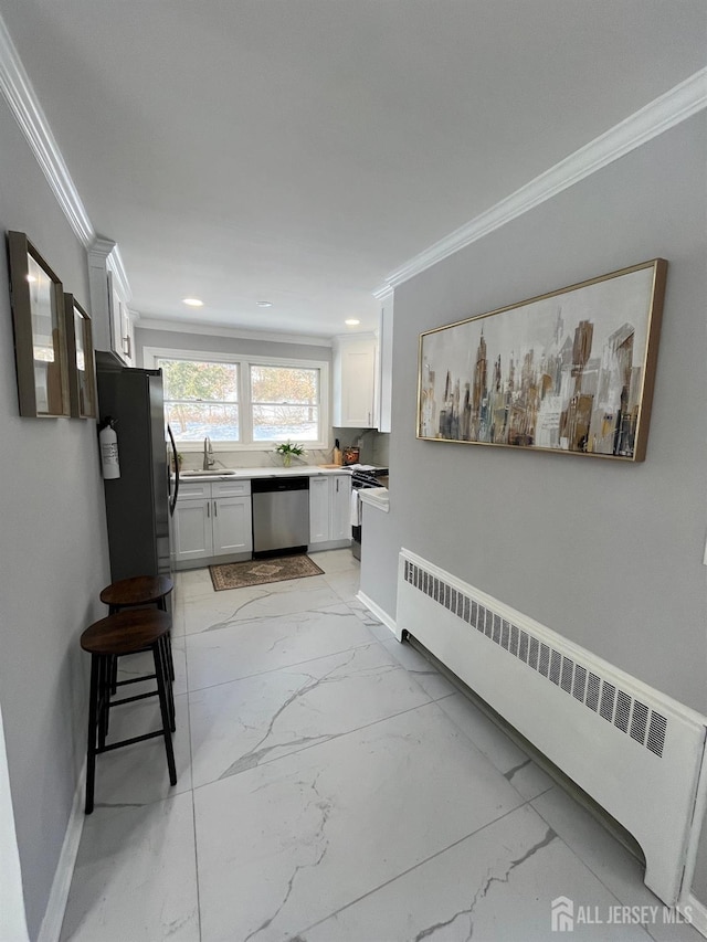 interior space with recessed lighting, a sink, baseboards, marble finish floor, and crown molding