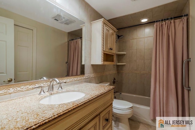 10 Lauri Ln, Middlesex, NJ 08846 - full bath featuring vanity, toilet, tile patterned floors, and shower / tub combo