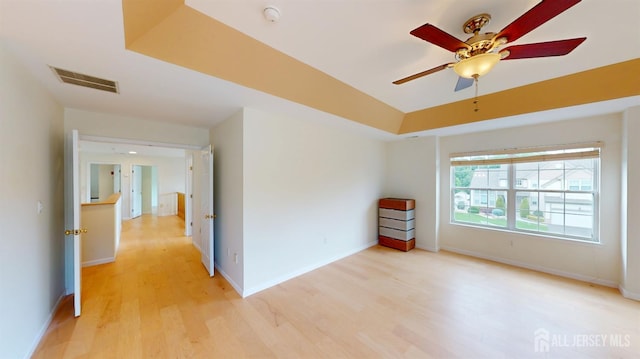 53 Kirschman Dr, Old Bridge, NJ 07747 - spare room with light wood finished floors, a ceiling fan, and a smoke detector