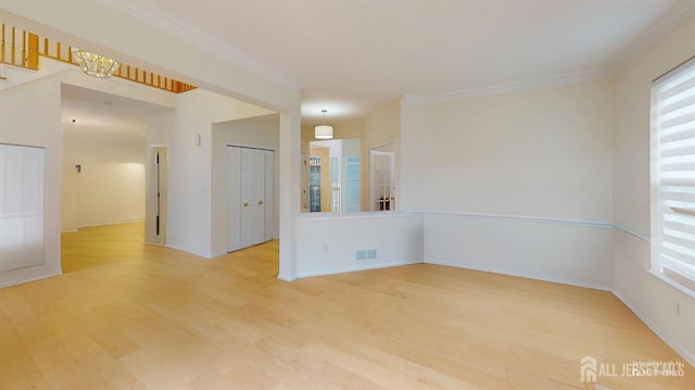 53 Kirschman Dr, Old Bridge, NJ 07747 - unfurnished room with wood finished floors, crown molding, and plenty of natural light