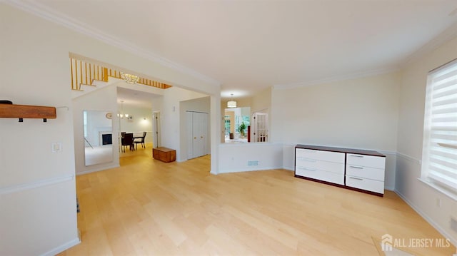 53 Kirschman Dr, Old Bridge, NJ 07747 - empty room with light wood-style floors and crown molding