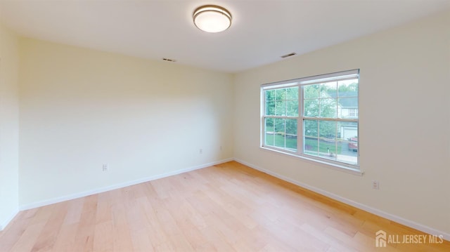 53 Kirschman Dr, Old Bridge, NJ 07747 - unfurnished room with light wood-style flooring