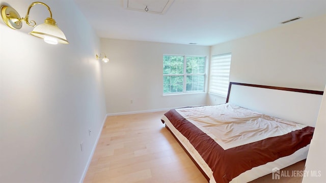 53 Kirschman Dr, Old Bridge, NJ 07747 - bedroom with attic access and light wood finished floors