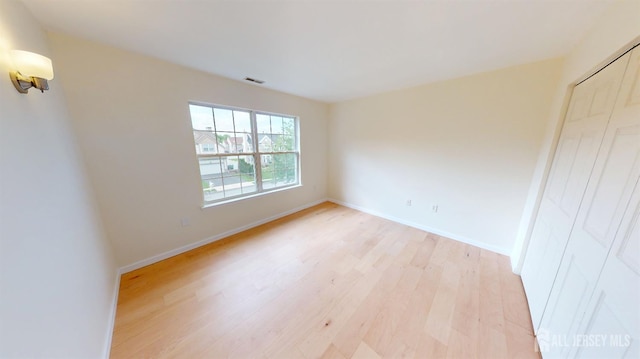 53 Kirschman Dr, Old Bridge, NJ 07747 - unfurnished room with light wood finished floors and baseboards