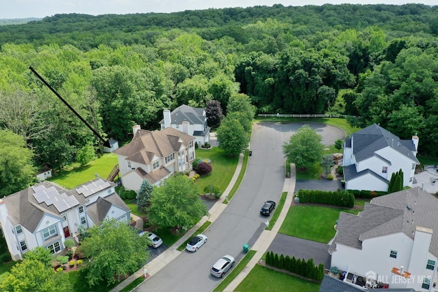 53 Kirschman Dr, Old Bridge, NJ 07747 - aerial view of residential area featuring a forest