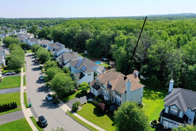 53 Kirschman Dr, Old Bridge, NJ 07747 - aerial perspective of suburban area with a heavily wooded area