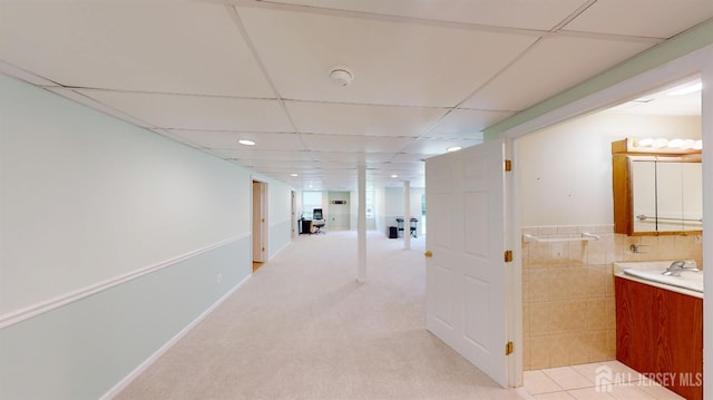 53 Kirschman Dr, Old Bridge, NJ 07747 - hallway with a paneled ceiling and tile walls