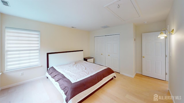 53 Kirschman Dr, Old Bridge, NJ 07747 - bedroom featuring attic access, light wood-style floors, and a closet