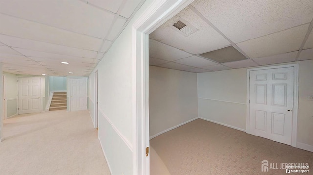 53 Kirschman Dr, Old Bridge, NJ 07747 - finished below grade area featuring carpet floors, a paneled ceiling, and stairs
