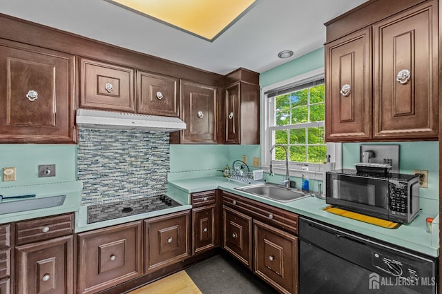 kitchen with dark brown cabinets, sink, tasteful backsplash, and black appliances