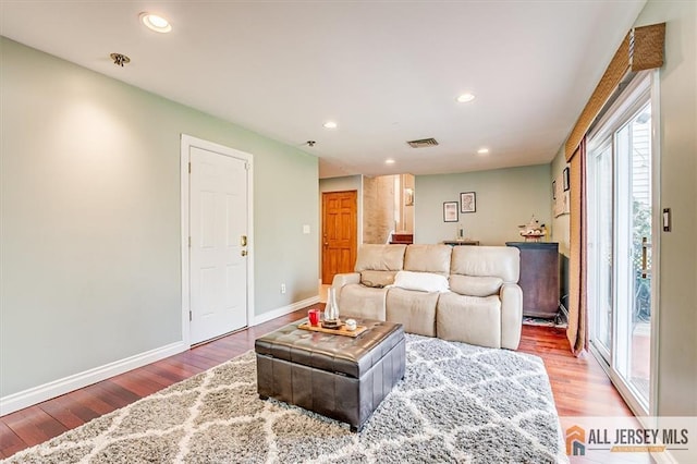 6 Mockingbird Rd, Edison, NJ 08820 - living room with light wood-type flooring, plenty of natural light, baseboards, and recessed lighting