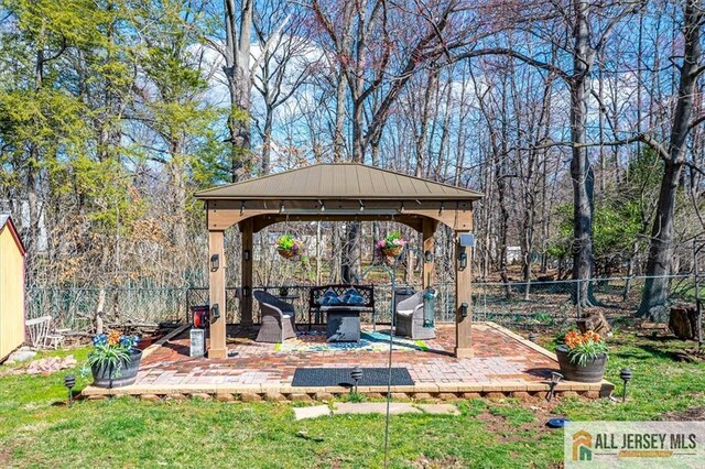 6 Mockingbird Rd, Edison, NJ 08820 - view of patio featuring a gazebo and an outdoor fire pit