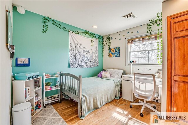 6 Mockingbird Rd, Edison, NJ 08820 - bedroom featuring wood finished floors and recessed lighting