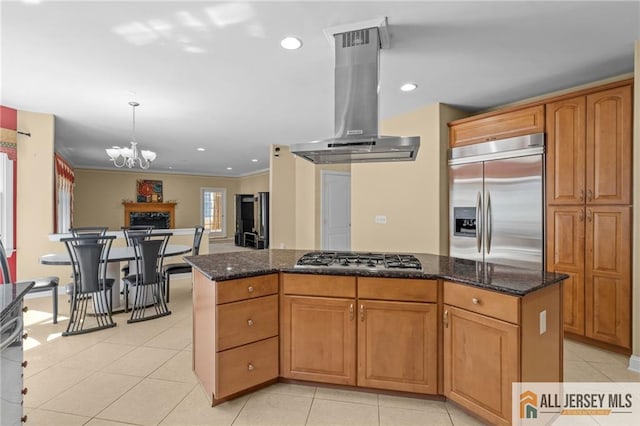 482 Spotswood Gravel Hill Rd, Monroe, NJ 08831 - kitchen featuring stainless steel appliances, range hood, dark stone counters, a chandelier, and ornamental molding