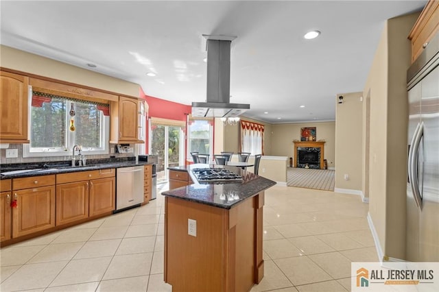 482 Spotswood Gravel Hill Rd, Monroe, NJ 08831 - kitchen featuring appliances with stainless steel finishes, island exhaust hood, a kitchen island, a sink, and dark stone counters