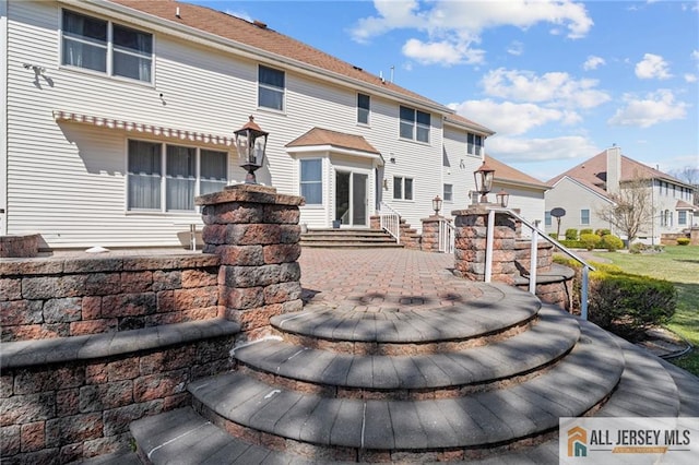 482 Spotswood Gravel Hill Rd, Monroe, NJ 08831 - rear view of property with a residential view, a patio area, and entry steps