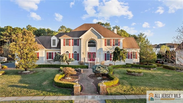 482 Spotswood Gravel Hill Rd, Monroe, NJ 08831 - view of front facade with a chimney and a front yard