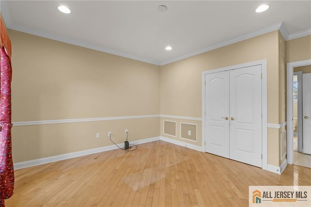 482 Spotswood Gravel Hill Rd, Monroe, NJ 08831 - unfurnished bedroom with hardwood / wood-style floors, baseboards, a closet, recessed lighting, and ornamental molding