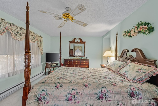 bedroom featuring carpet flooring, ceiling fan, a baseboard radiator, and a textured ceiling